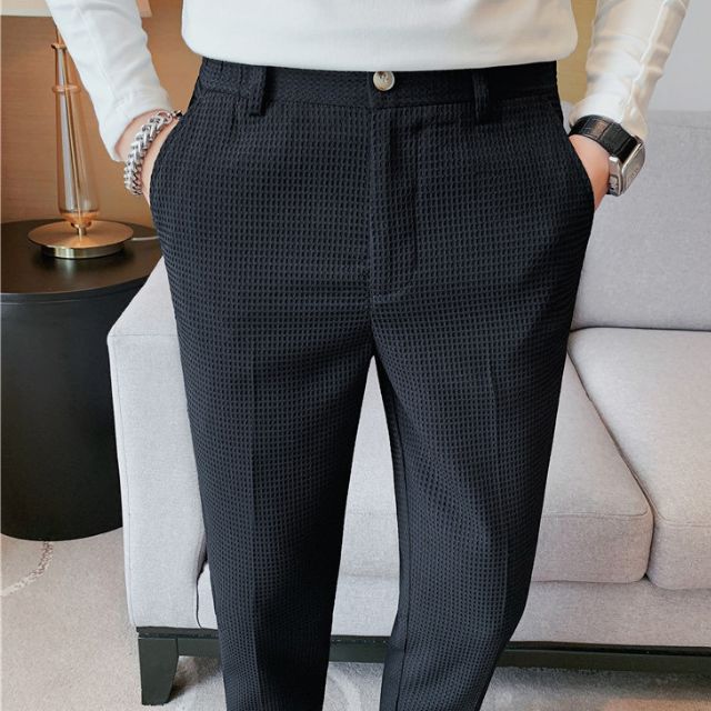 Slim-fit trousers with a subtle checked pattern