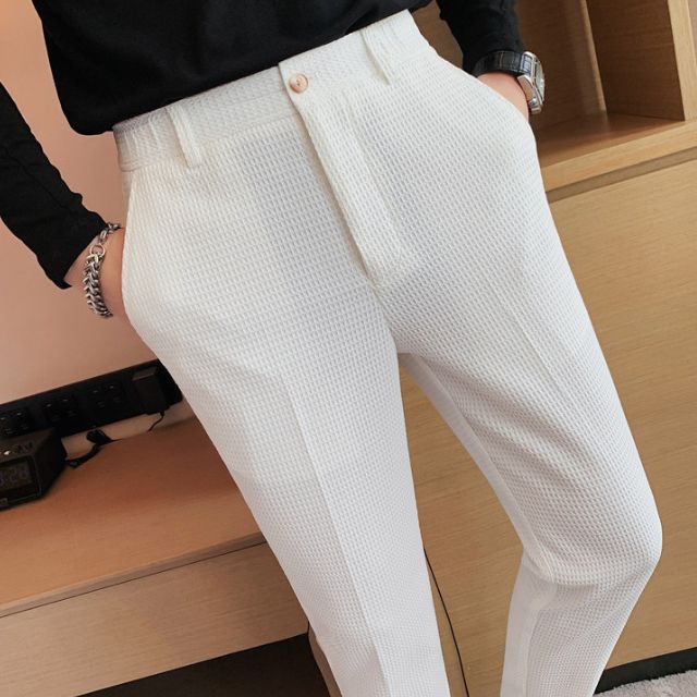 Slim-fit trousers with a subtle checked pattern