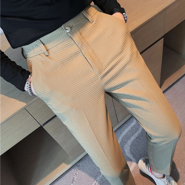 Slim-fit trousers with a subtle checked pattern