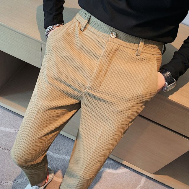 Slim-fit trousers with a subtle checked pattern