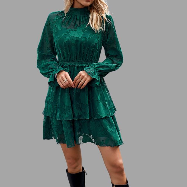 Flowing tiered mini dress with embossed floral detail