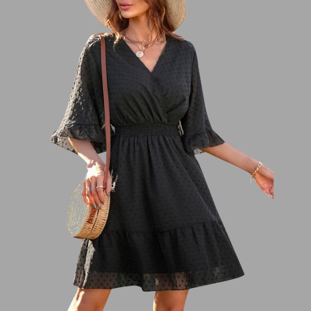 Dotted dress with gathered waist and bell sleeves