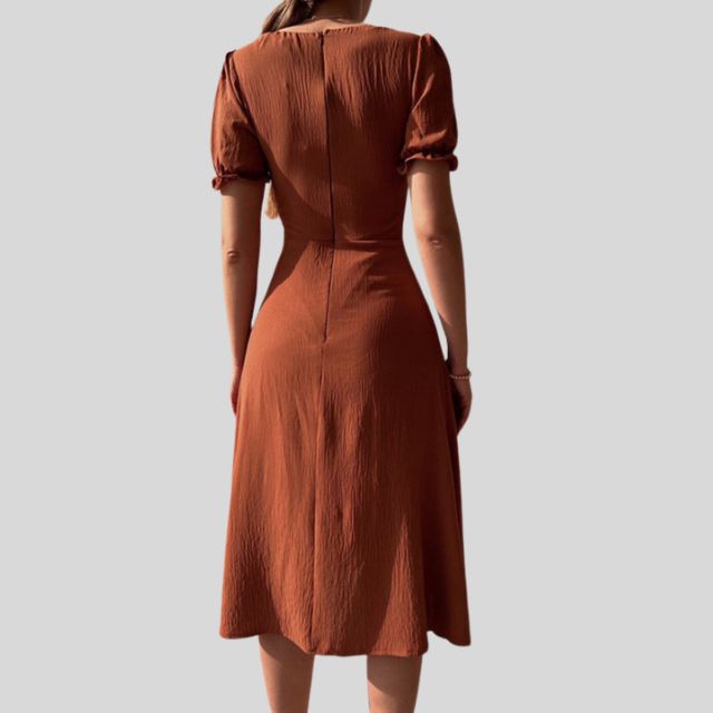 Midi dress with puff sleeves, button placket and slit at the hem