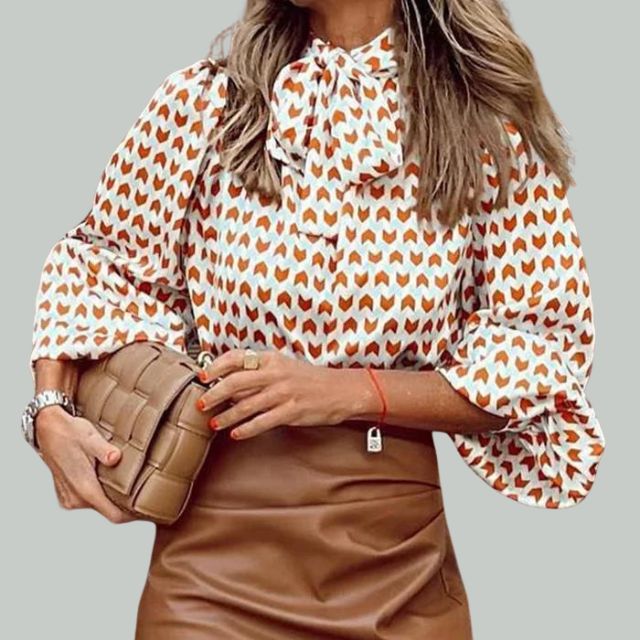 Houndstooth print blouse with high collar