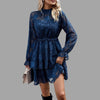 Flowing tiered mini dress with embossed floral detail