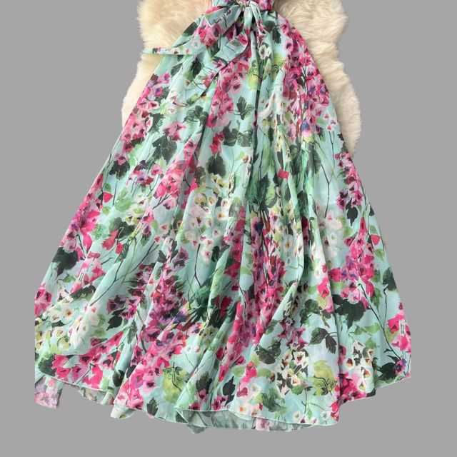 Floral dress with halterneck and ruffle detail