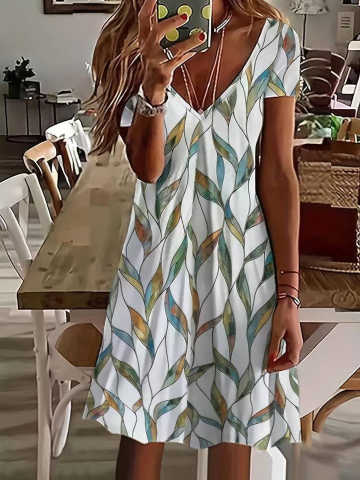 V-neck dress with leaf pattern