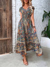 Long dress with ruffled paisley detail