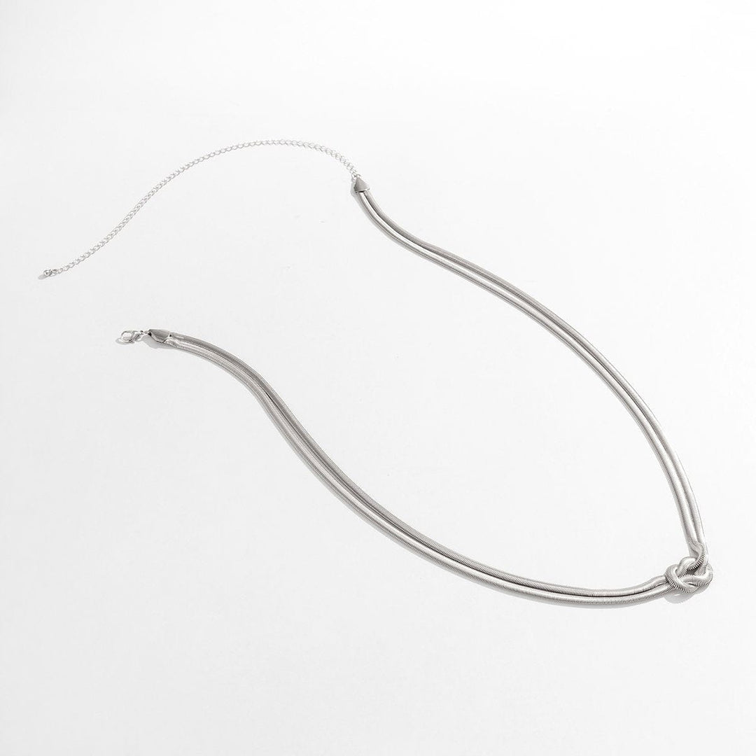 Minimalist double-layered waist chain with knot accent